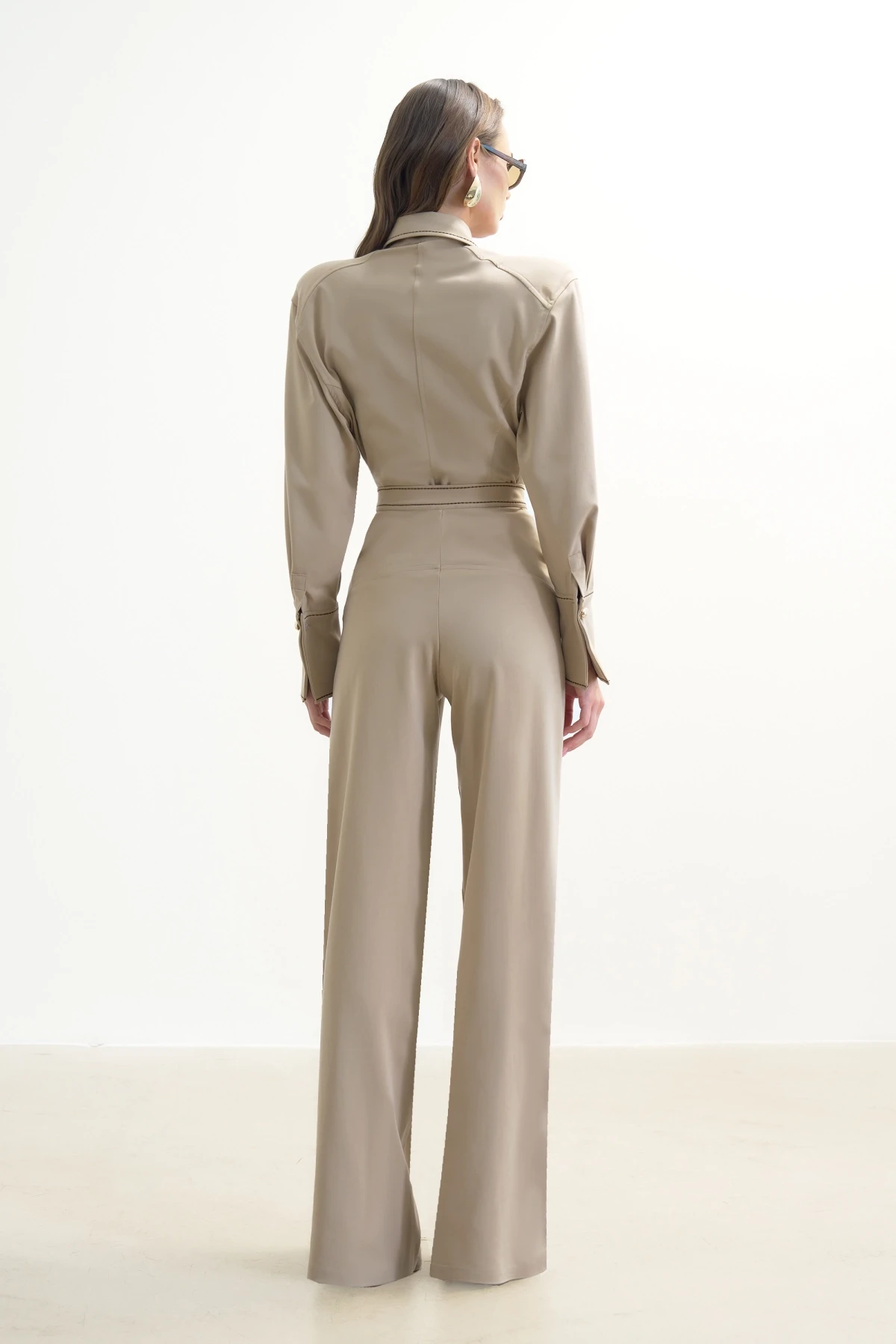 BEIGE SHIRT WITH GOLD BUTTONS AND BROWN STITCHING DETAIL