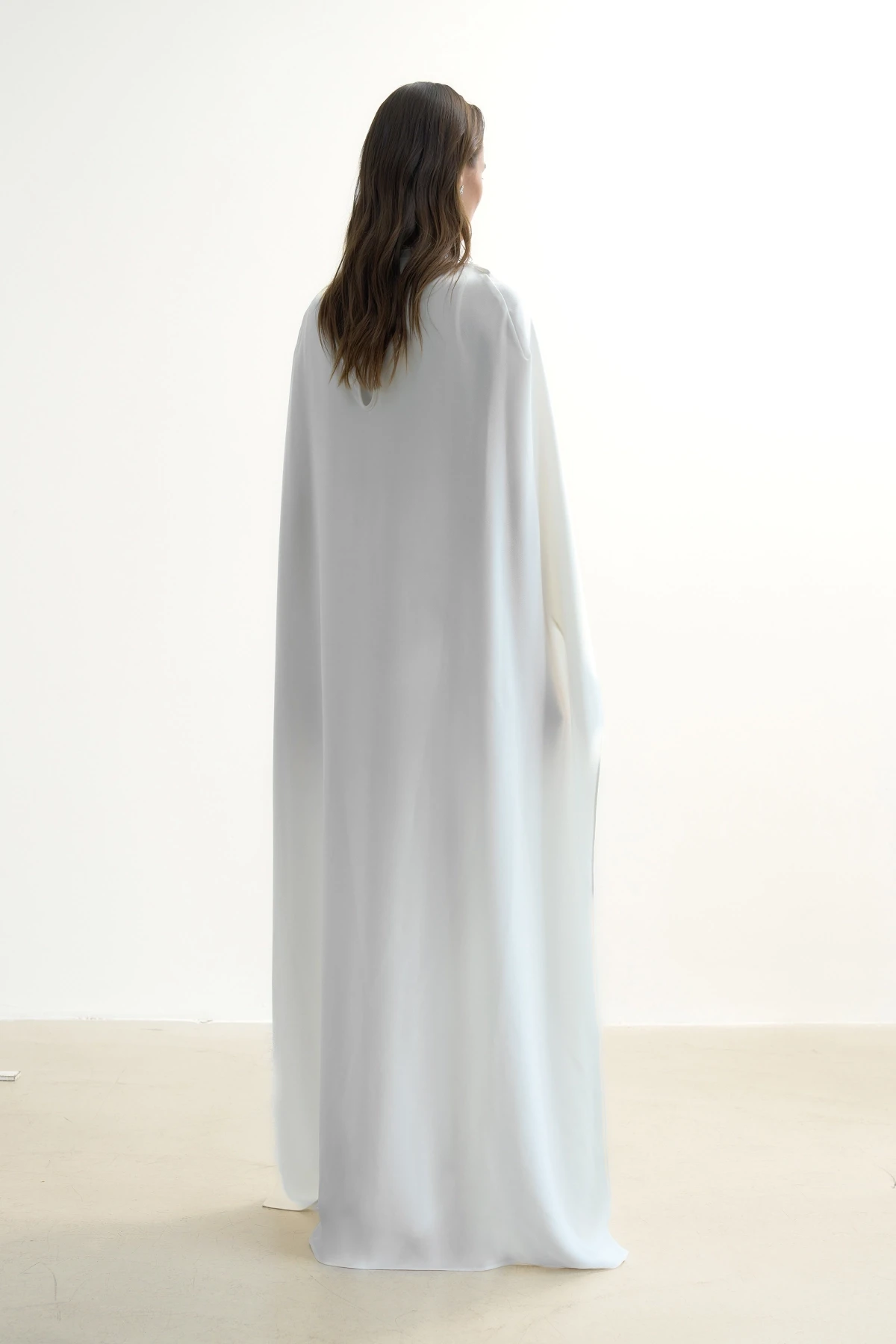 OFF-WHITE TOP WITH CAPE DETAIL